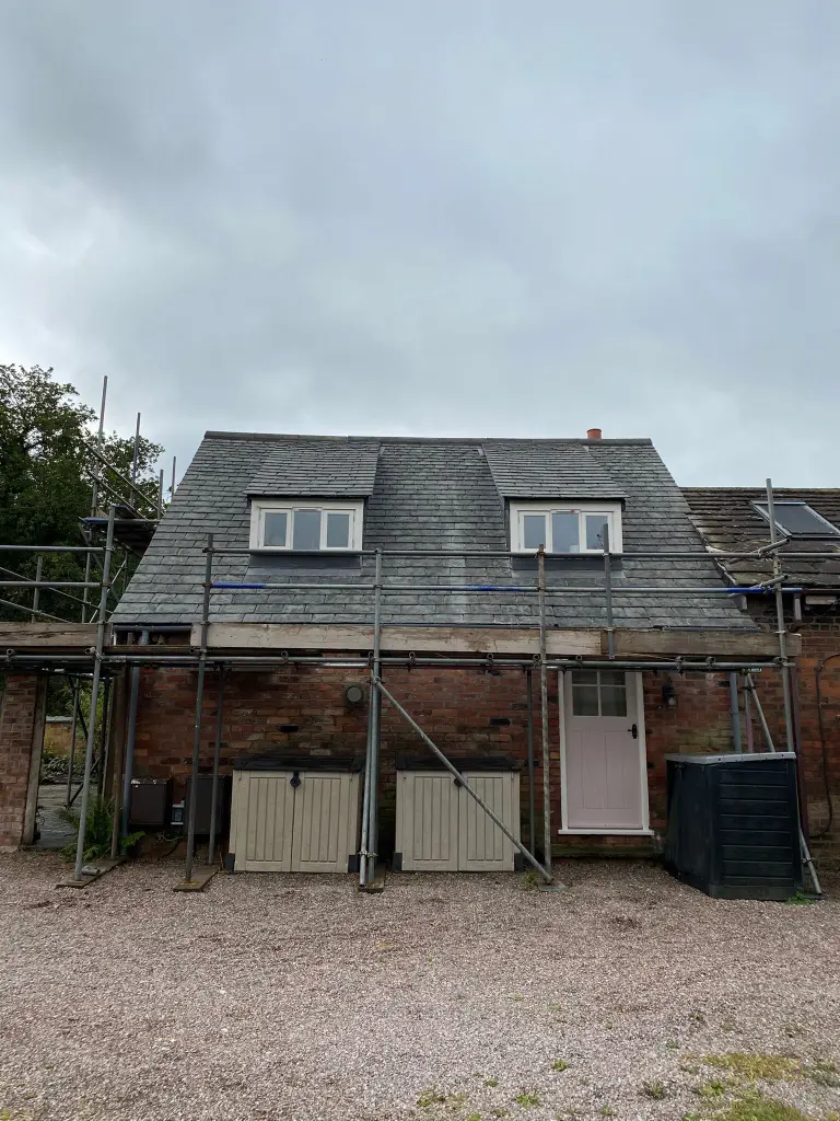 New modern clay tile roof after Thatched Replacement