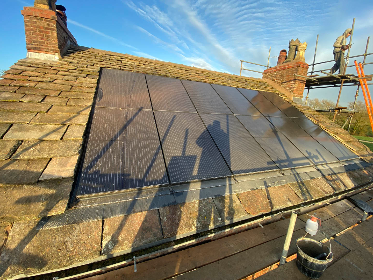 Reclaimed stone roof with integrated solar panels in Wilmslow